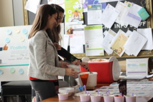 MCRC HR employees scooping ice-cream for employees for Mental Health Day
