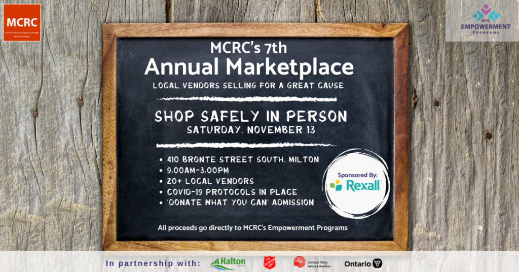 MCRC Marketplace flyer. Text on a chalkboard with a red bow on a wood background. 