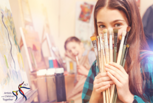 A girl holds a bunch of paintbrushes in her hands. ACT logo