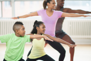 family doing yoga