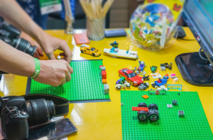 lego pieces being used to create a stop motion video