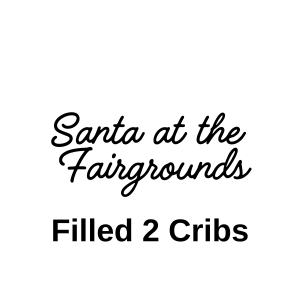 Text that says Santa at the Fairgrounds filled 2 cribs