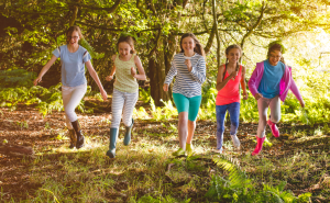 Girls running and playing outside 