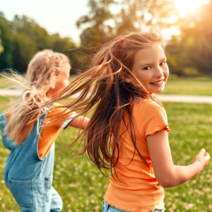 girls running and playing outside