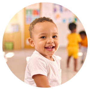 photo of a toddler smiling at the camera