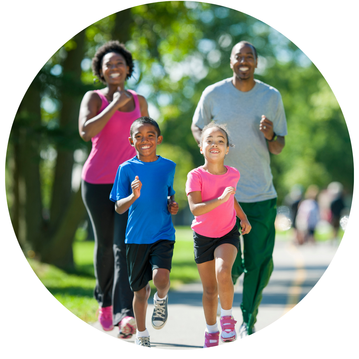 photo of family walking briskly together outdoors