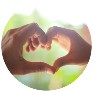 Two hands held up together in the shape of a heart