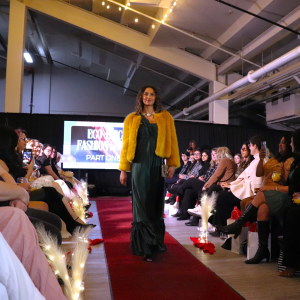 a female model walks the runway at Eco Chic 2025