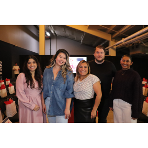 Group of smiling people at Eco Chic 2025