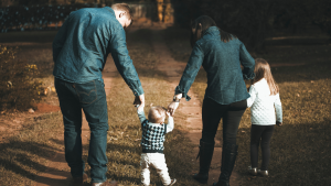 Family walking together on a trail