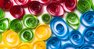 many pieces of quilled coloured paper