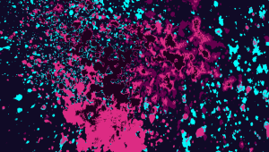 Neon paint spatter on a black background